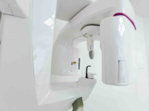 Cone beam CT scanner in a dental imaging room
